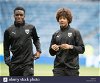 oxford-players-kevin-berkoe-and-fabio-lopes-out-on-the-park-before-the-pre-season-friendly-at-ibrox-stadium-glasgow-W29NC7.jpg Thumbnail